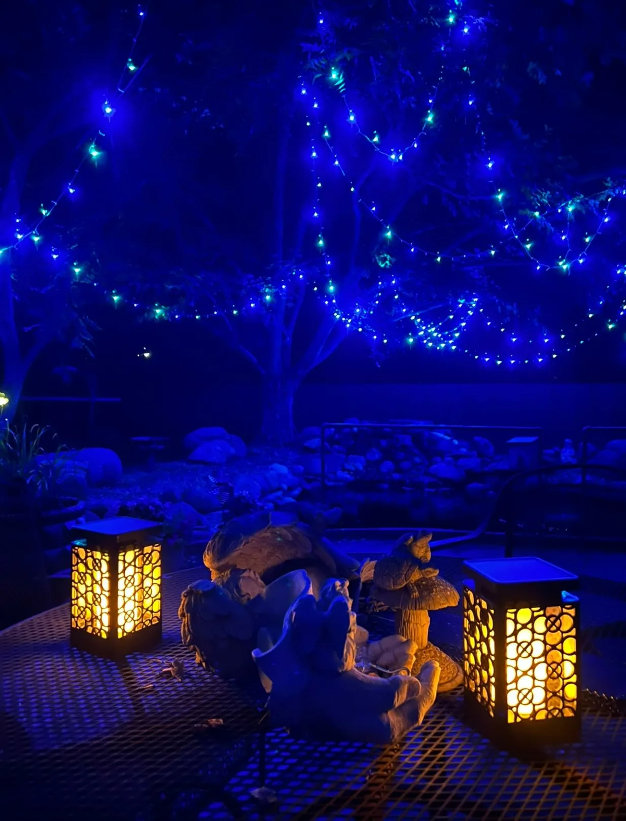 Blue Stringlights Warm Lamp Metal Table Hanging Tree Bottom Angle View Outdoor Lights For Christmas