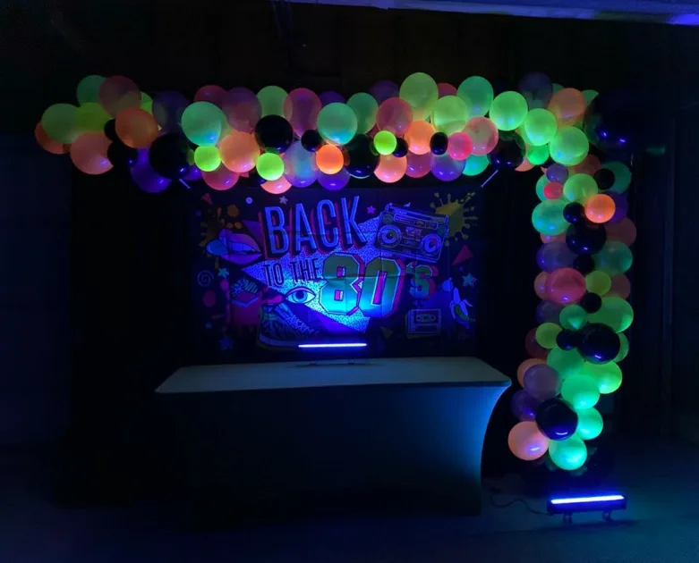Black Party Lights Table And Balloon Arch