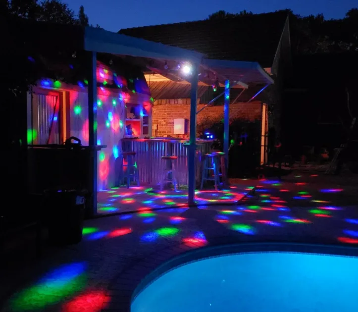 Strobe Lights Pool Side Party At Night